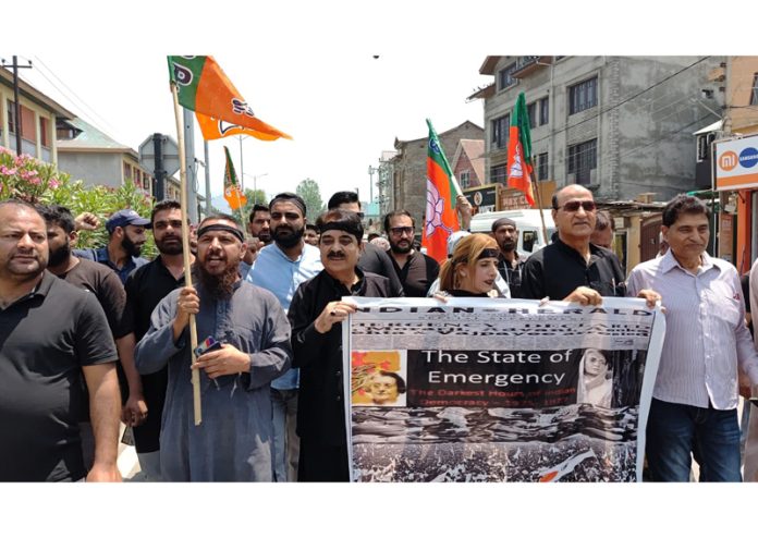 BJP leaders and activists taking out a protest march against the imposition of emergency by Congress on this day in 1975 in Srinagar. —Excelsior/Shakeel BJP leaders and activists taking out a protest march against the imposition of emergency by Congress on this day in 1975 in Srinagar. —Excelsior/Shakeel