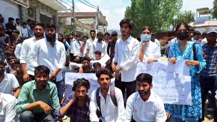College students protesting against new guidelines for admission in 5th semester. College students protesting against new guidelines for admission in 5th semester.