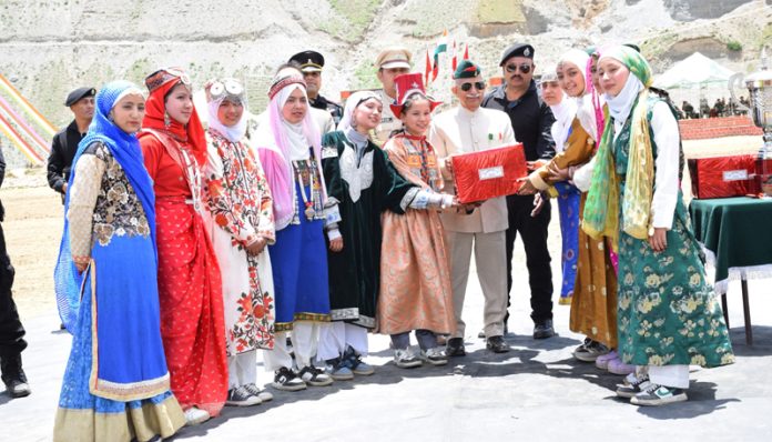 LG Ladakh, Brig (Dr) B D Mishra felicitating the participants of the Summer Carnival in Dras on Monday. LG Ladakh, Brig (Dr) B D Mishra felicitating the participants of the Summer Carnival in Dras on Monday.