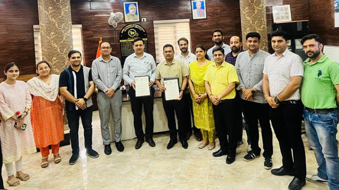 Senior officers of JKEDI and Government Polytechnic College Jammu posing together after signing MoU.