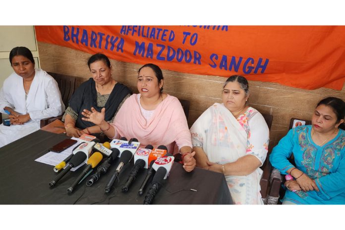 Anganwadi Workers Welfare Association members addressing press conference at Jammu on Saturday. -Excelsior/Rakesh Anganwadi Workers Welfare Association members addressing press conference at Jammu on Saturday. -Excelsior/Rakesh