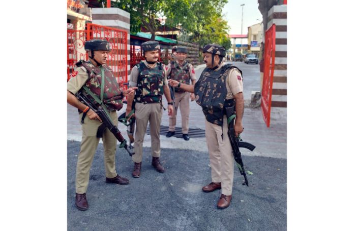 Police personnel during mock drill at Bhagwati Nagar Yatri Niwas.