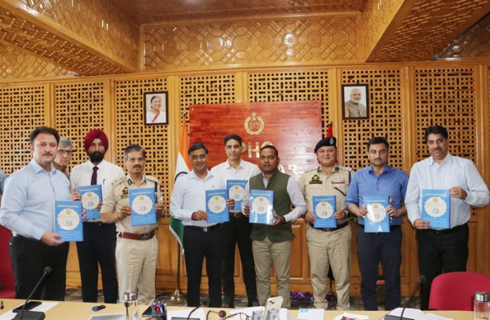DGP RR Swain releasing Urdu Compendium on New Criminal Laws in Srinagar on Tuesday.