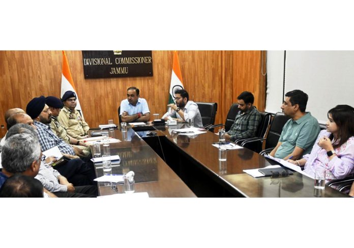 Div Com Ramesh Kumar chairing a meeting on Saturday.