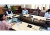 CS Atal Dulloo chairing a meeting at Srinagar on Friday.
