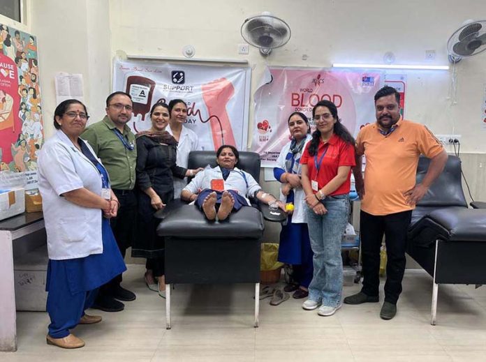 A staff nurse donating blood during a camp at GMC Jammu. A staff nurse donating blood during a camp at GMC Jammu.