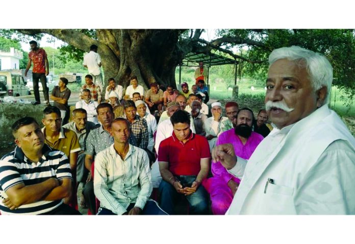 NC’s addl gen secy and former Minister, Ajay Sadhotra addressing meeting in Jammu North on Sunday.