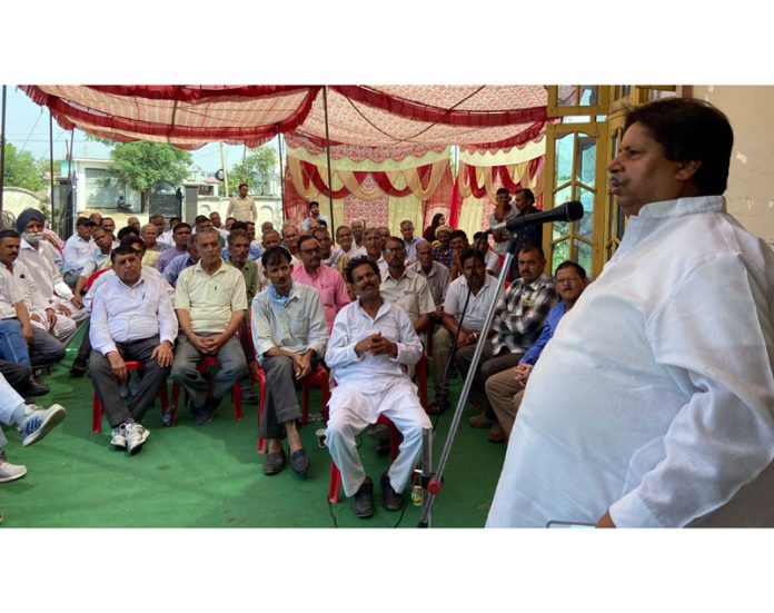 Senior Cong leader Raman Bhalla addressing public meeting in Samba on Sunday.