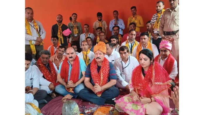 Chairperson DDC Udhampur Lal Chand, DC Udhampur Saloni Rai and others attending Puja at inaugural of Sudhmahadev Mela on Friday. Chairperson DDC Udhampur Lal Chand, DC Udhampur Saloni Rai and others attending Puja at inaugural of Sudhmahadev Mela on Friday.