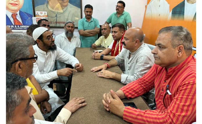 BJP vice president, Yudhvir Sethi listening public grievances at Jammu on Thursday.