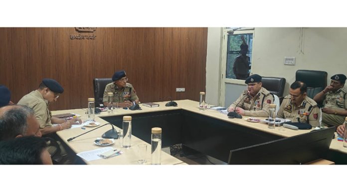 ADGP Jammu, Anand Jain, chairing a meeting of police officers on Thursday.
