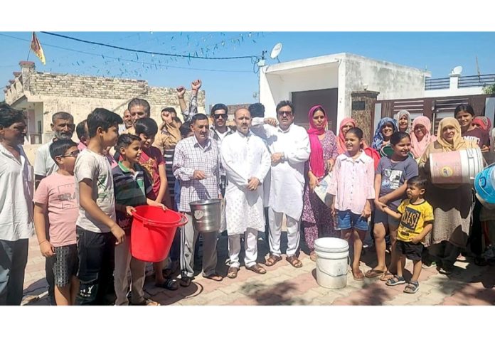 Locals in Chowadi raising slogans during a protest demonstration on Sunday.