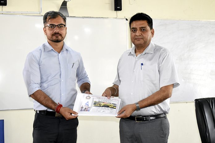 Dy Director SKPA presenting participation certificate on the concluding day of training course.