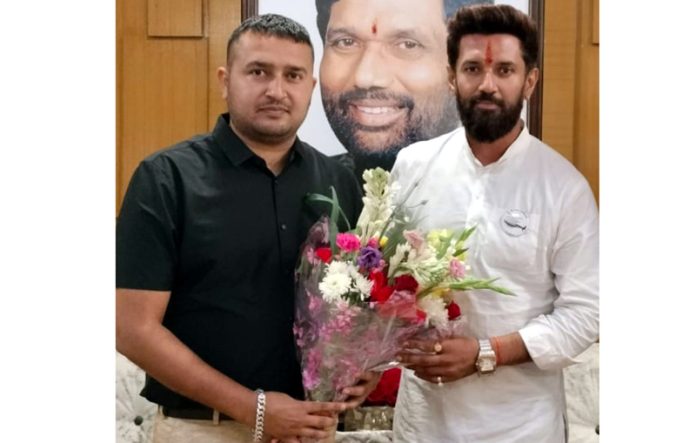 Bhanu Pratap Singh with Chirag Paswan in New Delhi.
