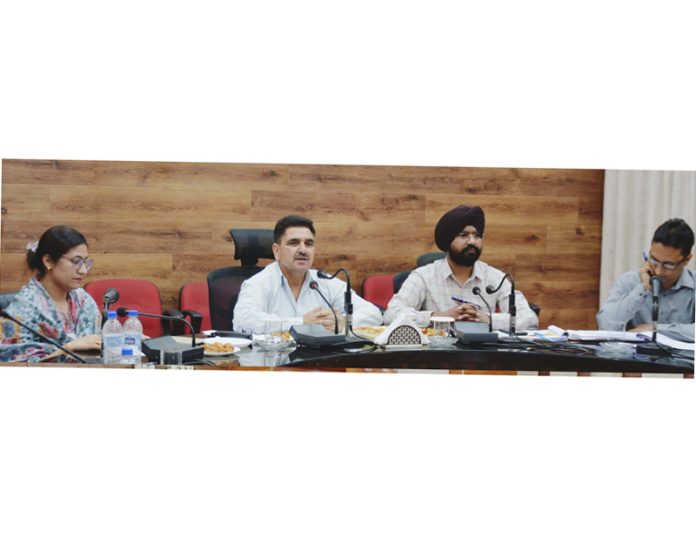 DDC Chairman Doda chairing a meeting.