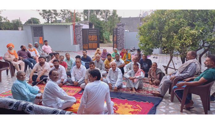 Cong leaders Hari Singh Chib and Uday Chib during meeting in Jammu North on Thursday.