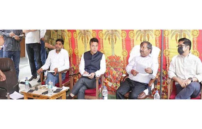 Dheeraj Gupta during public outreach programme at Srinagar. Dheeraj Gupta during public outreach programme at Srinagar.