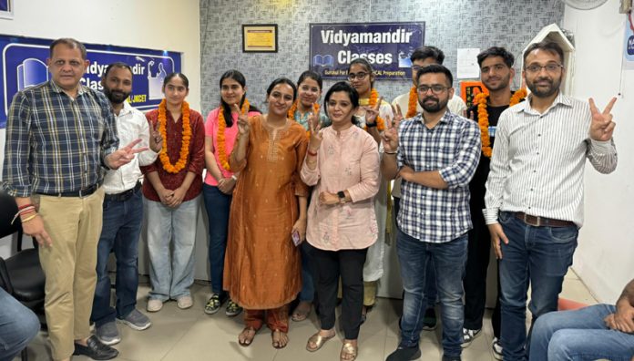 Students of VMC posing after their excellent performance in NEET 2024 examinations in Jammu on Wednesday. Students of VMC posing after their excellent performance in NEET 2024 examinations in Jammu on Wednesday.