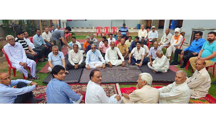 Cong leaders Hari Singh Chib, Uday Bhanu and others during party meeting in Jammu North on Saturday.