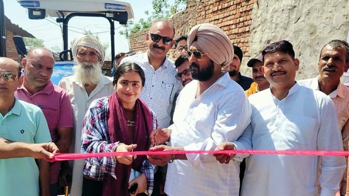 Congress leader Taranjit Singh Tony inaugurating a Custom Hiring Center in RS Pura on Wednesday.