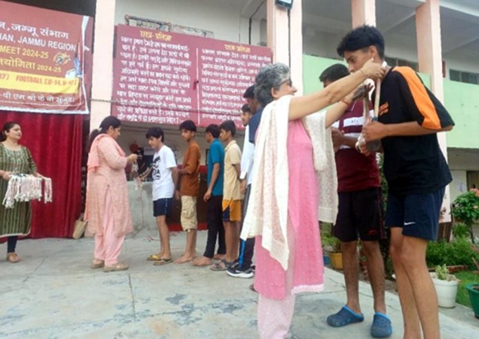 Dignitary presenting medals to players during closing ceremony of KVS Regional Sports Meet at Jammu. Dignitary presenting medals to players during closing ceremony of KVS Regional Sports Meet at Jammu.