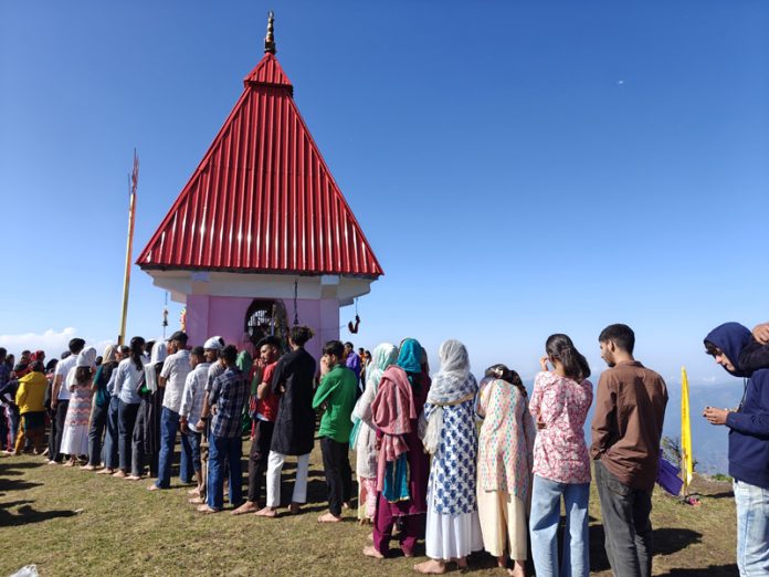 Devotees in queue at the shrine of Chamunda Mata shrine in Sarvadhar area of Ramban on Monday. -Excelsior/Shubam Anthal Devotees in queue at the shrine of Chamunda Mata shrine in Sarvadhar area of Ramban on Monday. -Excelsior/Shubam Anthal