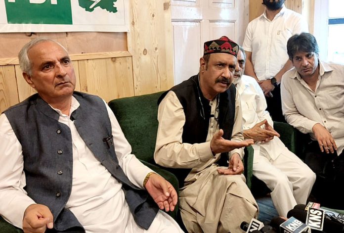 Basharat Bukhari addressing a press conference in Srinagar on Thursday. -Excelsior/Shakeel