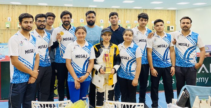 Shooters of MOSAJ posing along with trophy and coaching staff. Shooters of MOSAJ posing along with trophy and coaching staff.