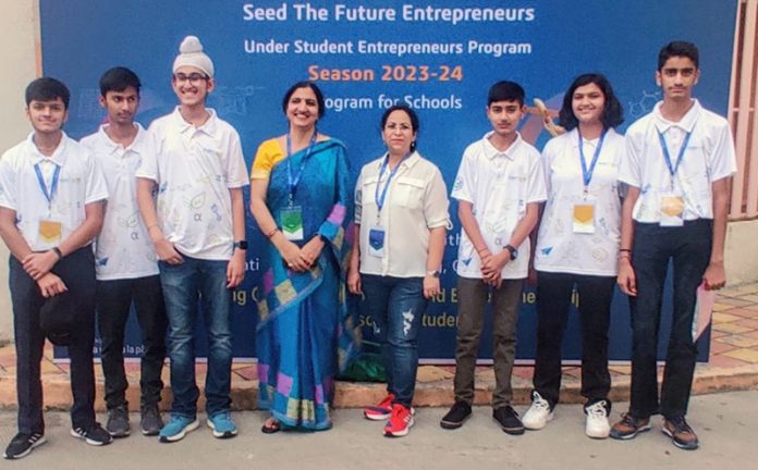 AFS students posing along with a teacher in 'Made in 3D' programme at Pune. AFS students posing along with a teacher in 'Made in 3D' programme at Pune.