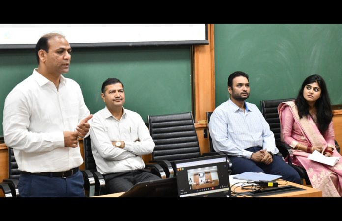 Guests listening to a speaker during inaugural of Leadership Development Program at IIM Jammu.
