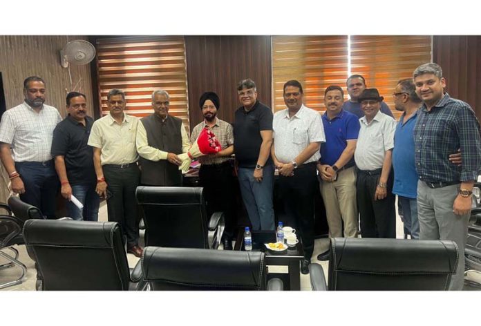 Transport Commissioner, Rajinder Singh Tara during meeting with the members of FADA in Jammu on Thursday.