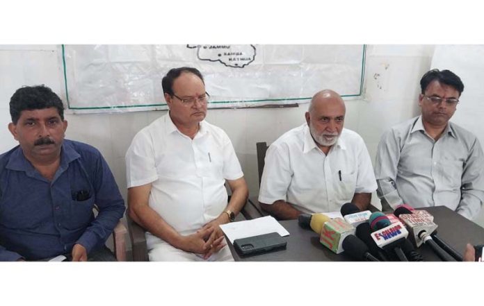 JPBM Chairman, Ashok Sharma addressing a press conference in Jammu on Thursday.