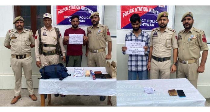 Police in Kishtwar presenting drug peddlers who were arrested on Saturday with heroin. -Excelsior/Tilak Raj Police in Kishtwar presenting drug peddlers who were arrested on Saturday with heroin. -Excelsior/Tilak Raj