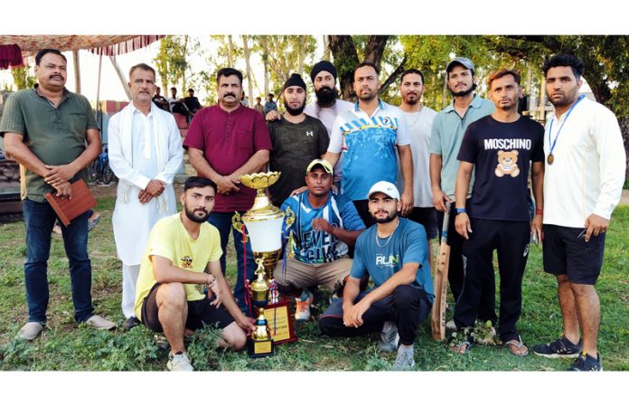 Captains of winning and runners up teams posing with their trophies. Captains of winning and runners up teams posing with their trophies.