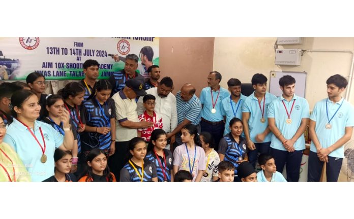 Shooters posing along with medals during prize distribution event at Jammu. Shooters posing along with medals during prize distribution event at Jammu.