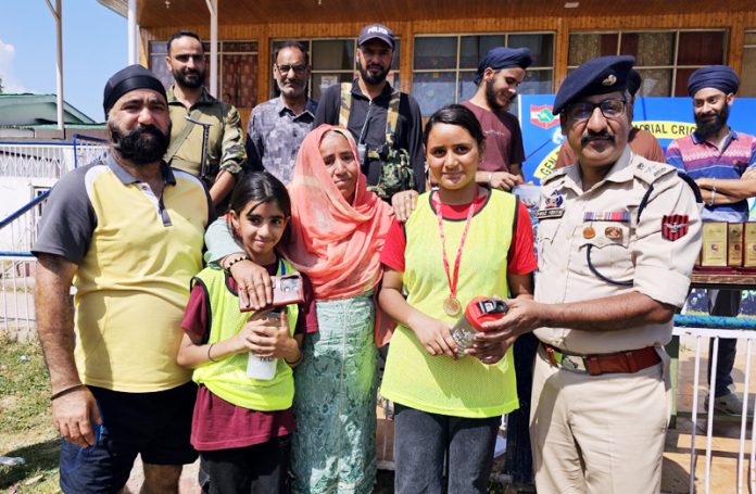 Participants of hockey summer camp posing with SP Firoz Yahya in Baramulla on Wednesday. —Excelsior/Aabid Nabi Participants of hockey summer camp posing with SP Firoz Yahya in Baramulla on Wednesday. —Excelsior/Aabid Nabi