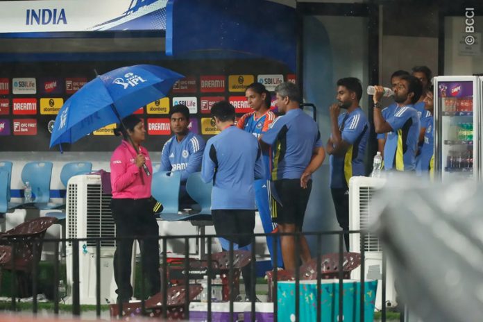 Indian Women’s team captain Harmanpreet Kour along with umpire and team staff waiting for rain to stop at Chennai on Sunday. Indian Women’s team captain Harmanpreet Kour along with umpire and team staff waiting for rain to stop at Chennai on Sunday.