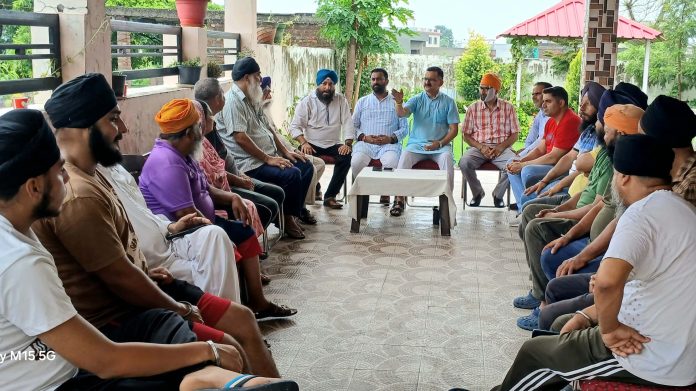 BJP leader, Sanjay Baru chairing a meeting at Jammu on Sunday.