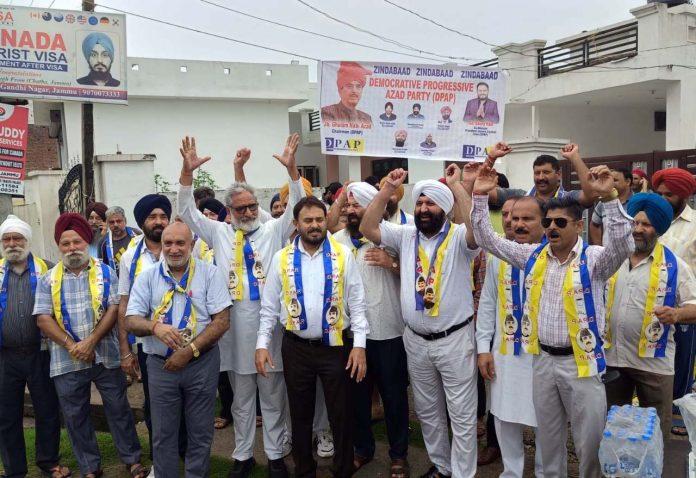 Leaders of DPAP staging protest against bad road condition of link road in RS Pura on Sunday. Leaders of DPAP staging protest against bad road condition of link road in RS Pura on Sunday.