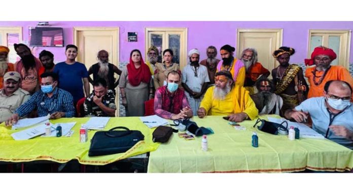 Dr Sushil Sharma examining patients.