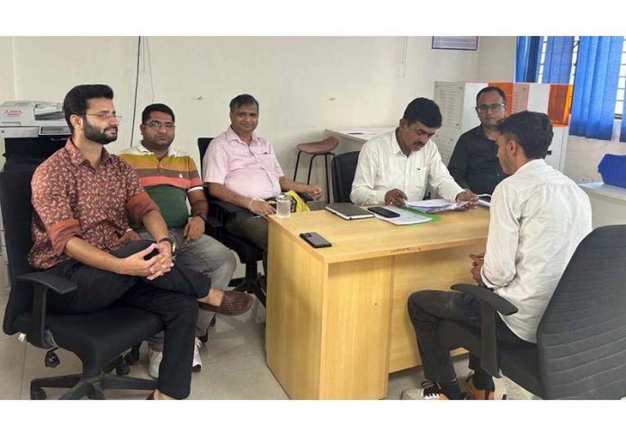 Students, faculty members and others at Government Polytechnic Jammu during a placement drive.