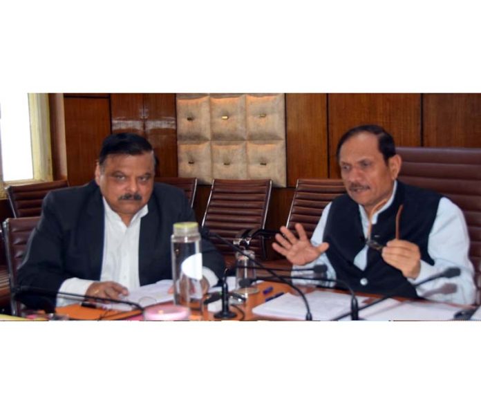 Advisor Bhatnagar chairing a meeting of School Education Deptt on Friday.