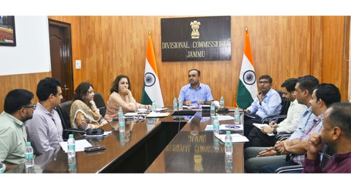 Divisional Commissioner Ramesh Kumar chairing a meeting on Tuesday.