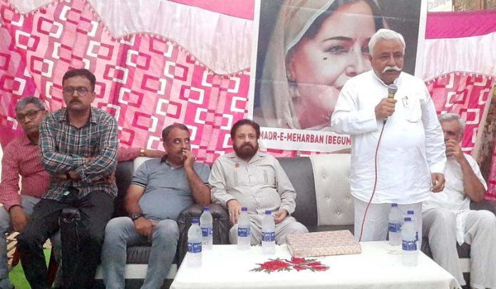 Senior NC leader Ajay Kumar Sadhotra addressing a public meeting in Janipur area of Jammu.