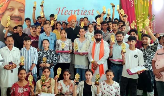 Senior BJP leader Devender Singh Rana with students, parents and teachers during a felicitation ceremony on Wednesday. Senior BJP leader Devender Singh Rana with students, parents and teachers during a felicitation ceremony on Wednesday.