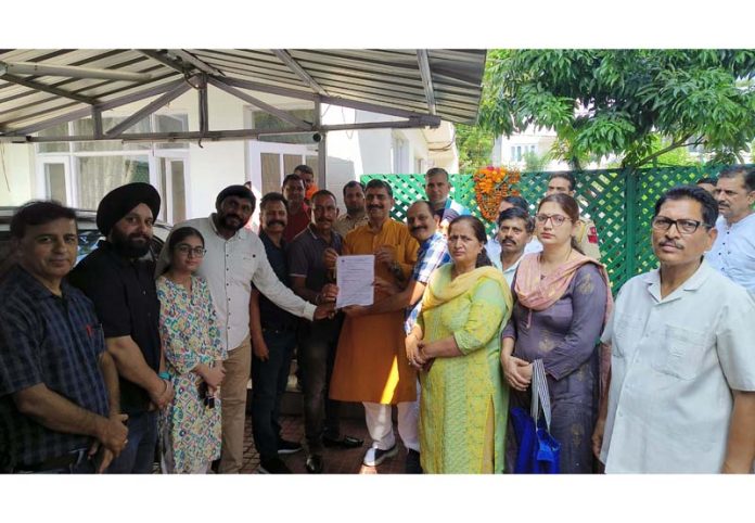 LIC employees submitting memorandum to MP Jugal Kishore Sharma. LIC employees submitting memorandum to MP Jugal Kishore Sharma.