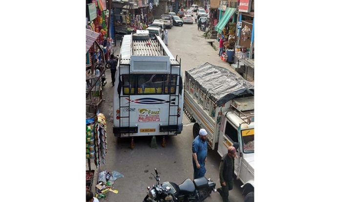 Wrongly parked vehicles at Bus Stand Gowari in Doda district. -Excelsior/Rafi Choudhary Wrongly parked vehicles at Bus Stand Gowari in Doda district. -Excelsior/Rafi Choudhary