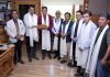 CEC Tashi Gyalson posing along with others during a programme held in Leh on Monday.
