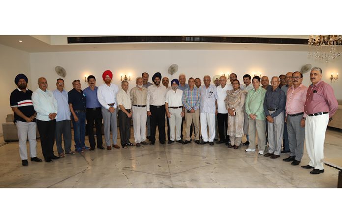 Retired police personnel during monthly meeting in Jammu on Sunday.
