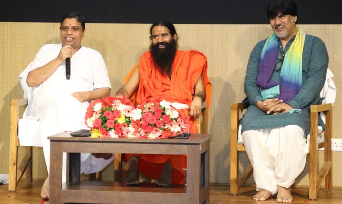 Yogrishi Swami Ramdev addressing a workshop at Patanjali University in Haridwar on Monday. Yogrishi Swami Ramdev addressing a workshop at Patanjali University in Haridwar on Monday.